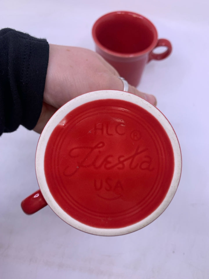 2 RED O-RING HANDLE MUGS.