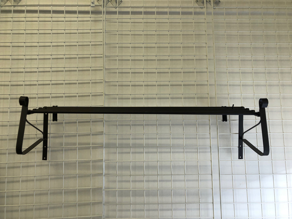 LARGE GREY SCROLL METAL WALL SHELF.