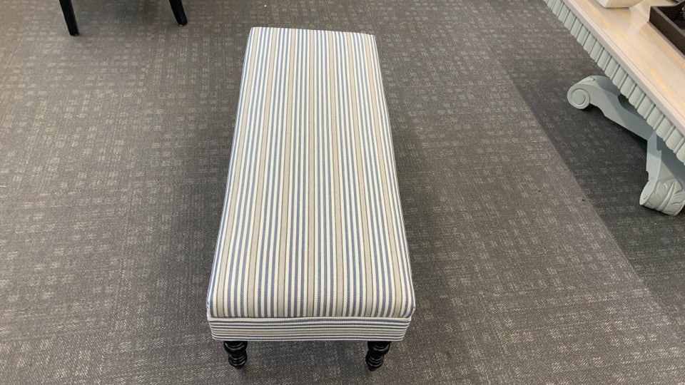 LONG BLUE STRIPPED OTTOMAN/BENCH ON WHEELS.