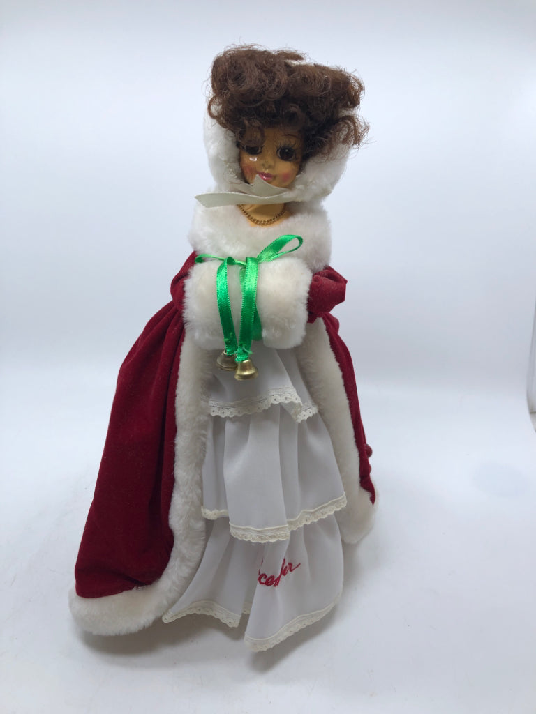 MUSICAL SPINNING DOLL LADY IN CLOAK.