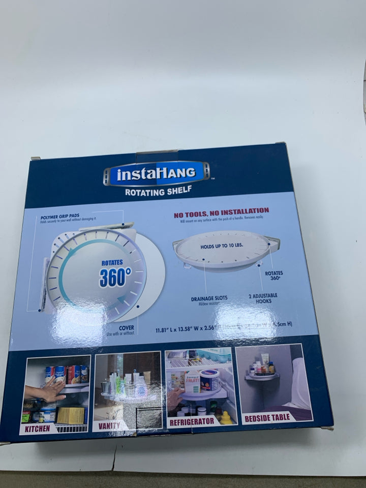 NIB ROTATING SHELF.