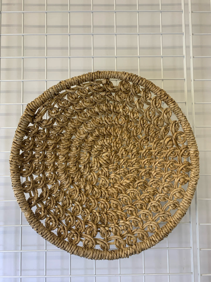 WOVEN CIRCLE BASKET WALL ART.