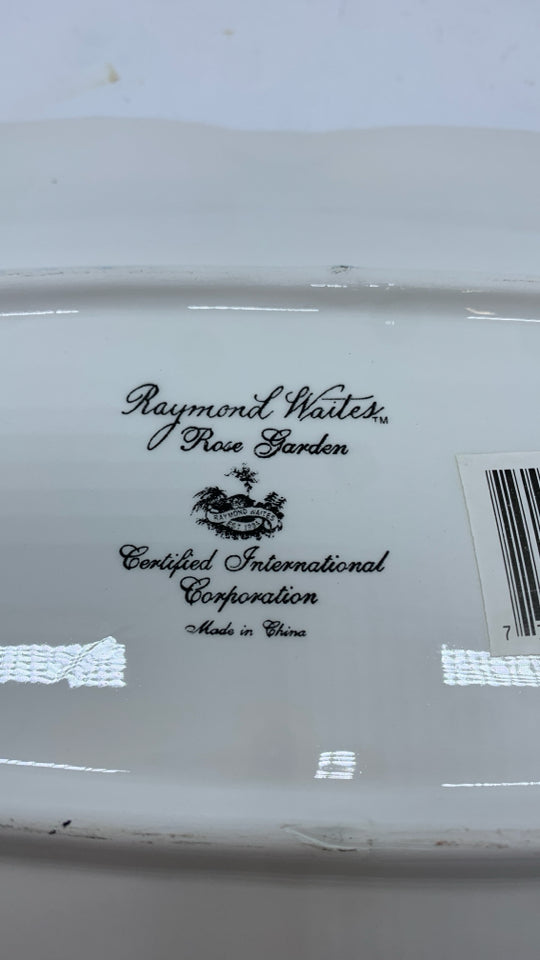 ROSE GARDEN PAINTED OVAL PLATTER W/BLUE BRAIDED EDGE.