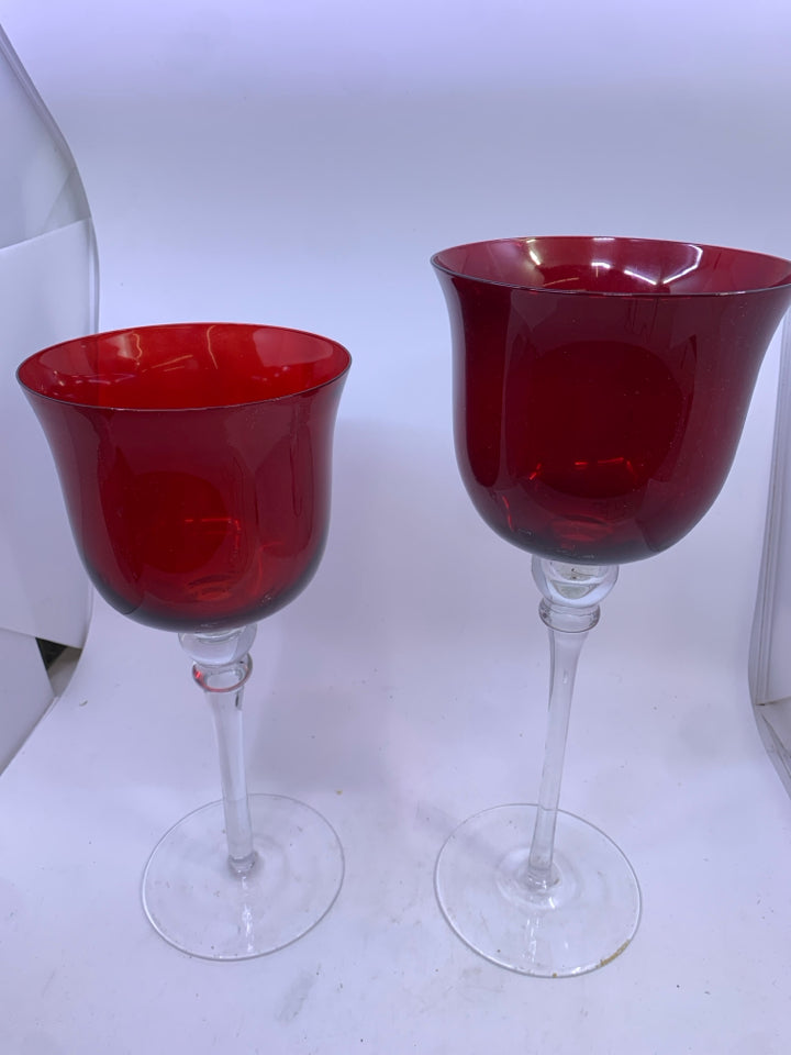 2 CLEAR GLASS STEM W/ RED GLASS TOP CANDLE HOLDERS.