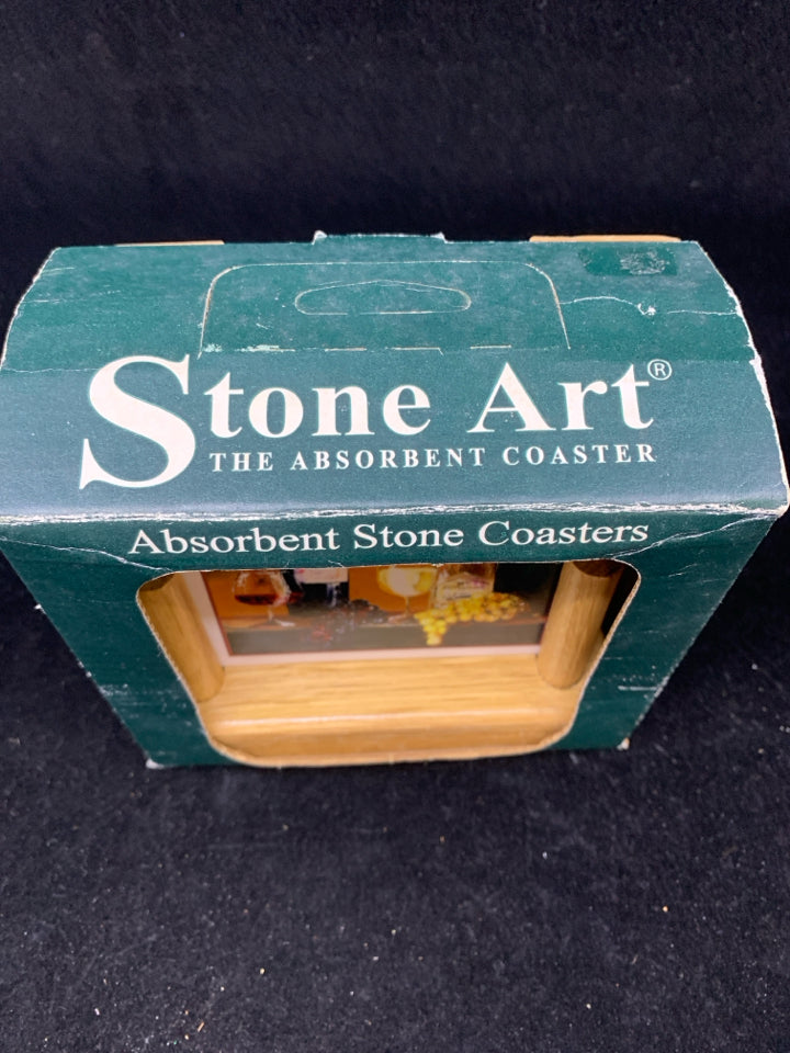 4 NIB WINE BOTTLES STONE COASTERS IN STAND.