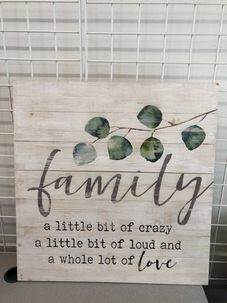 FAMILY IS A LITTLE BIT OF CRAZY WOODEN WALL ART.