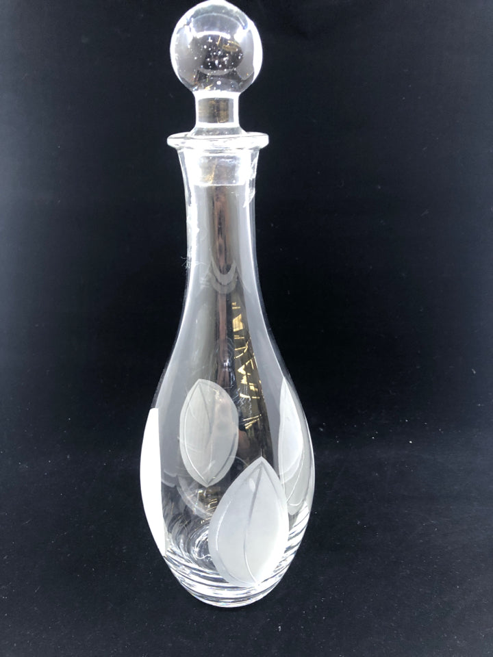 GLASS DECANTER W/ FROSTED LEAVES ON BOTTOM.