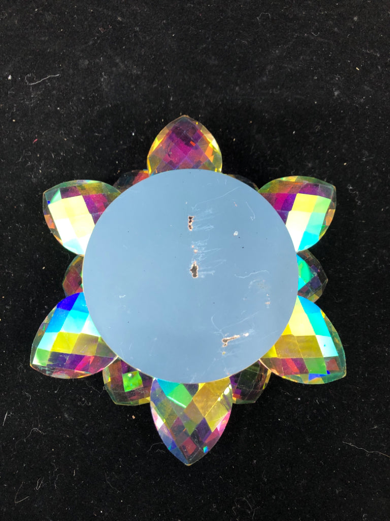 IRIDESCENT FLOWER GLASS CANDLE HOLDER.