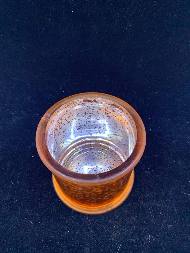 ORANGE MERCURY GLASS CANDLE HOLDER.