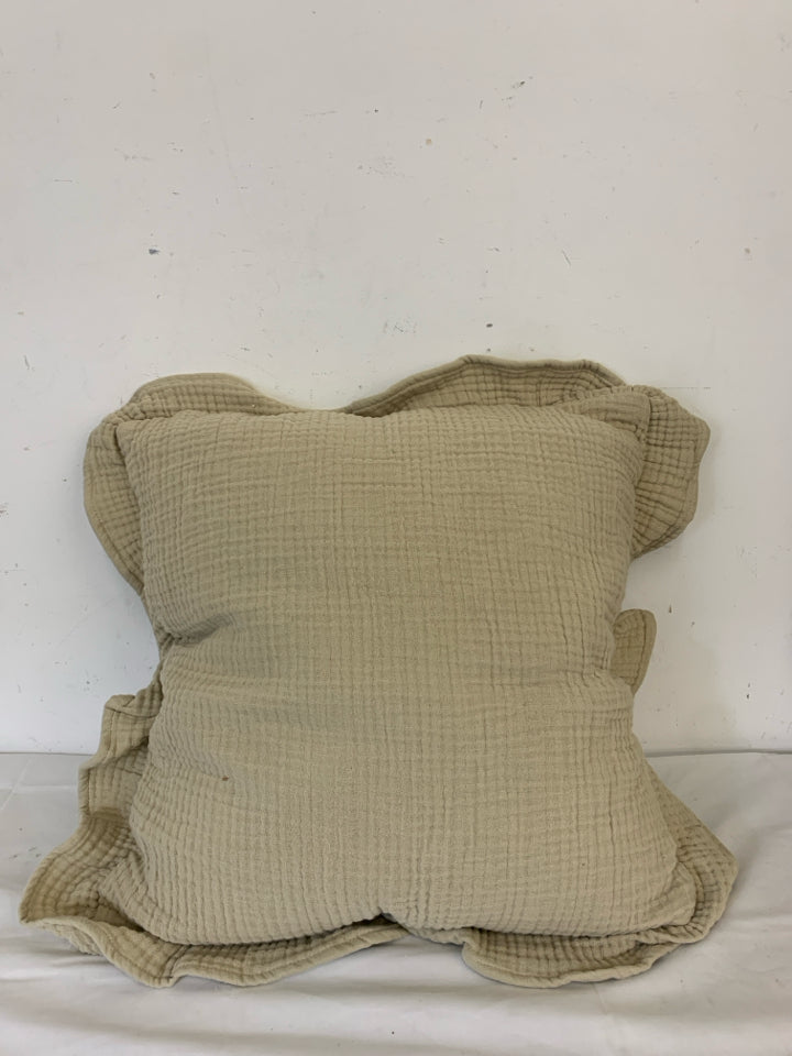 TAN RUFFLED EDGE SQUARE PILLOW.