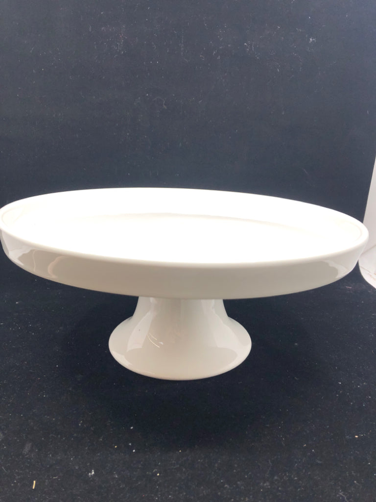 WHITE CERAMIC FOOTED CAKE STAND.