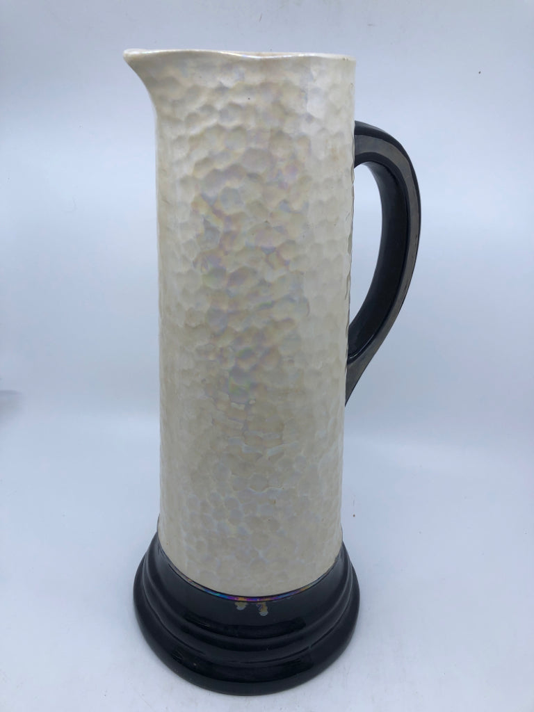 CREAM AND BLACK VASE W/MOTHER OF PEARL FINISH.