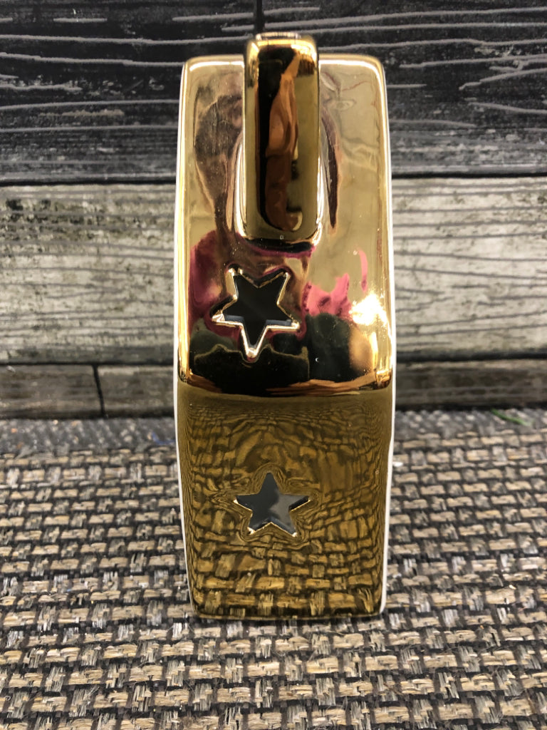 GOLD/ CREAM TEA LIGHT HOLDER HOUSE.