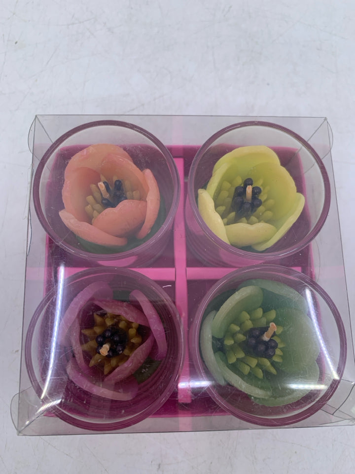 NIP 4 TEA LIGHT CANDLES W/ FLOWER SHAPED WAX.