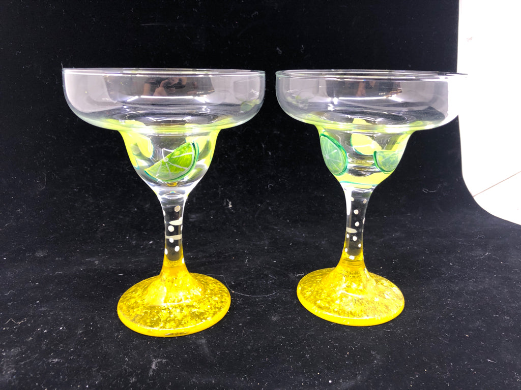 2 MARGARITA GLASSES W/ YELLOW STEM + PAINTED LIMES.