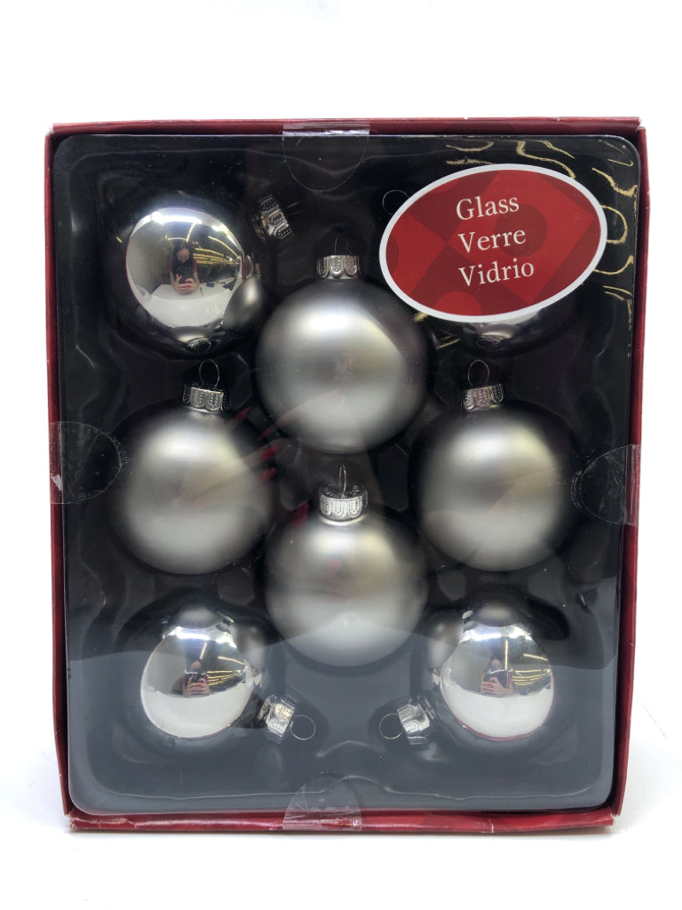 NIP 8 SILVER GLASS ORNAMENTS.