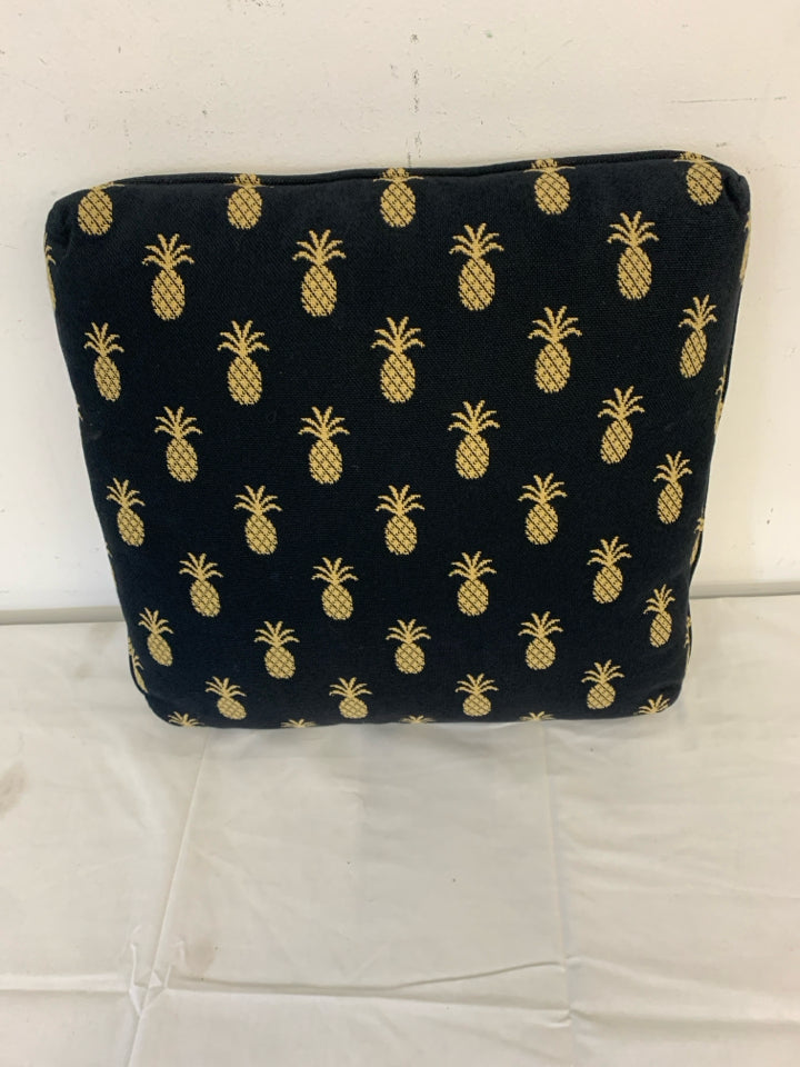 SQUARE BLACK PILLOW W/ PINEAPPLES.