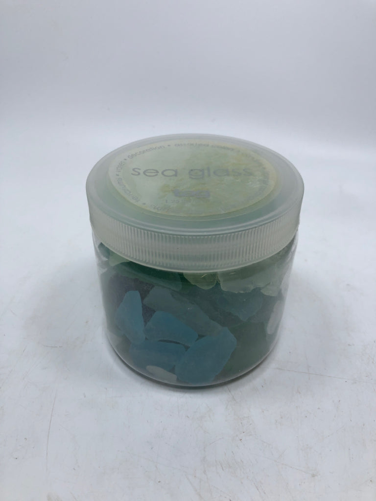 CONTAINER OF SEA GLASS.
