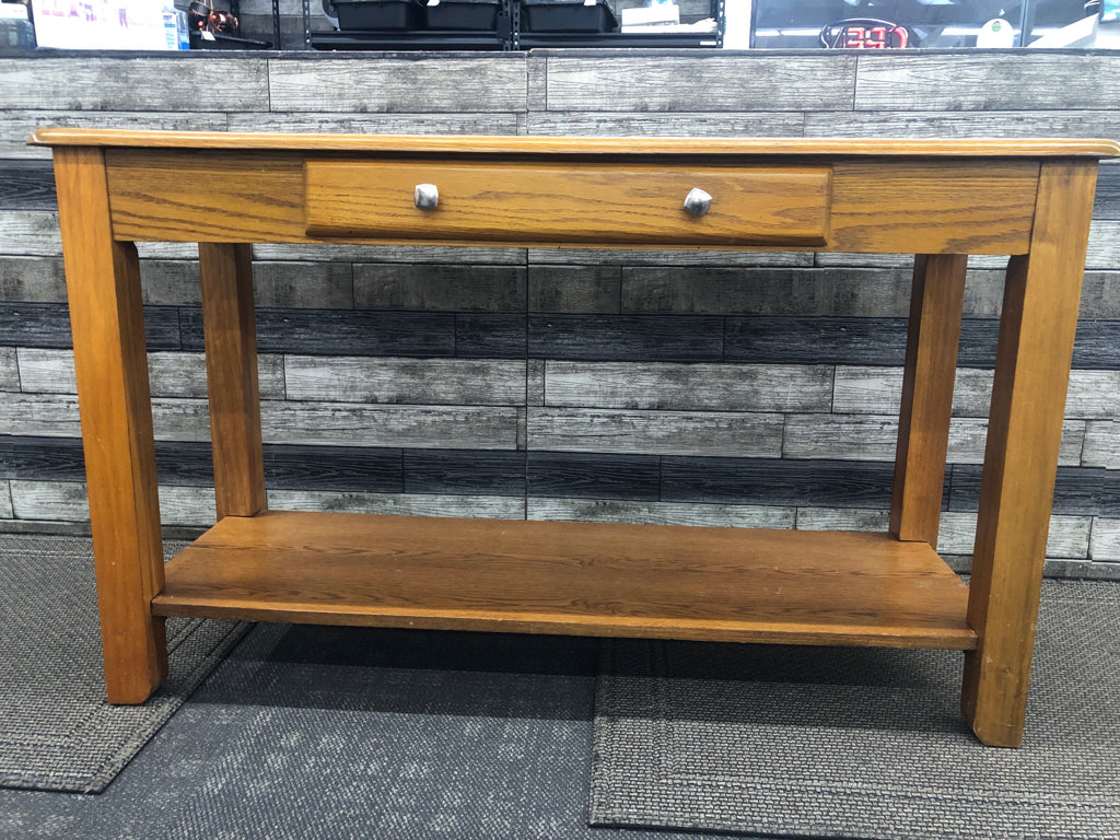 OAK WOOD CONSOLE TABLE W BOTTOM SHELF AND 1 DRAWER.