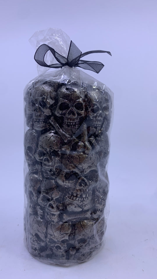 NIP STACKED SKULLS PILLAR CANDLE.