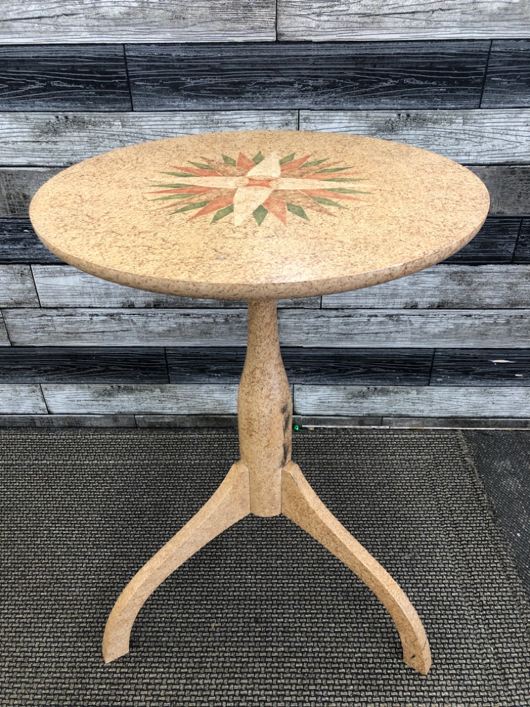 SMALL ROUND VTG TABLE W STAR PATTERN TOP.