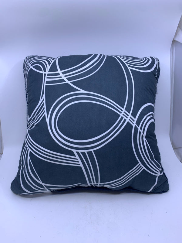 BLUE AND WHITE SCROLL PILLOW.