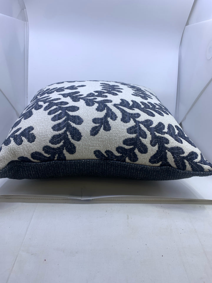 NAVY LEAF DETAIL, WHITE AND NAVY PILLOW.