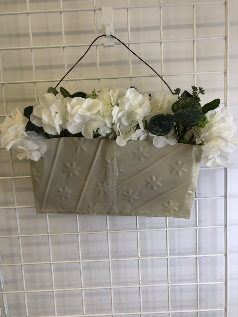 FAUX WHITE FLORAL METAL WALL POCKET.