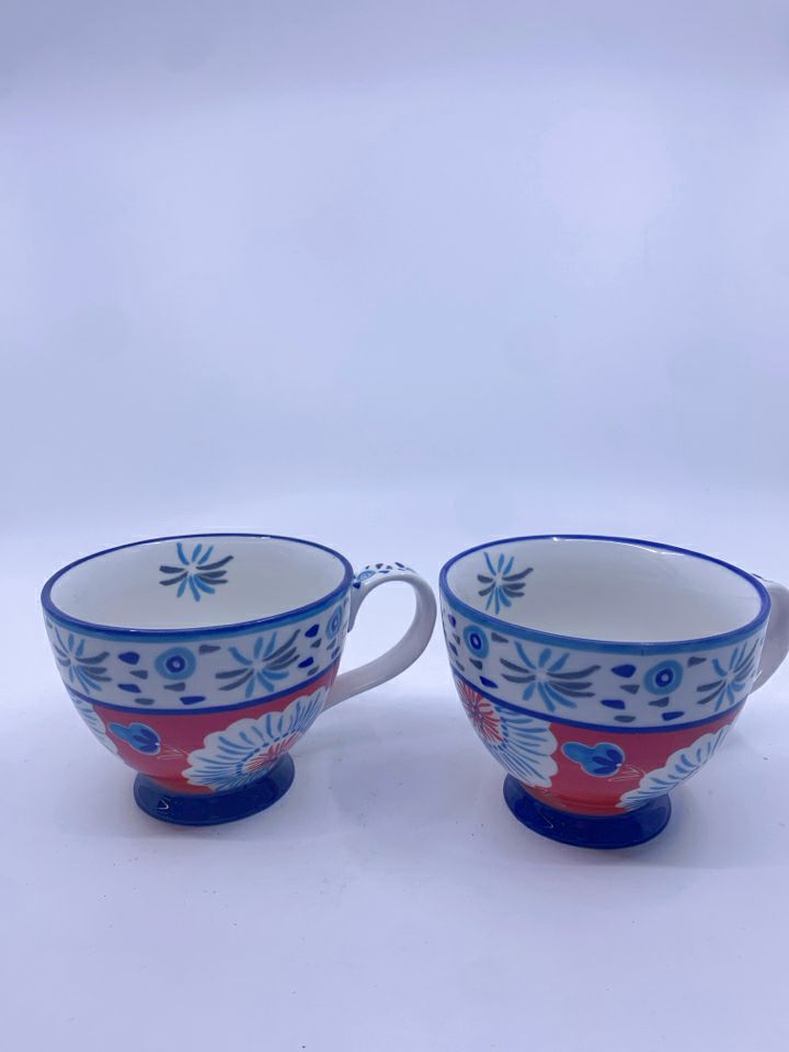 2 POTTERY STUDIO FLORAL MUGS.