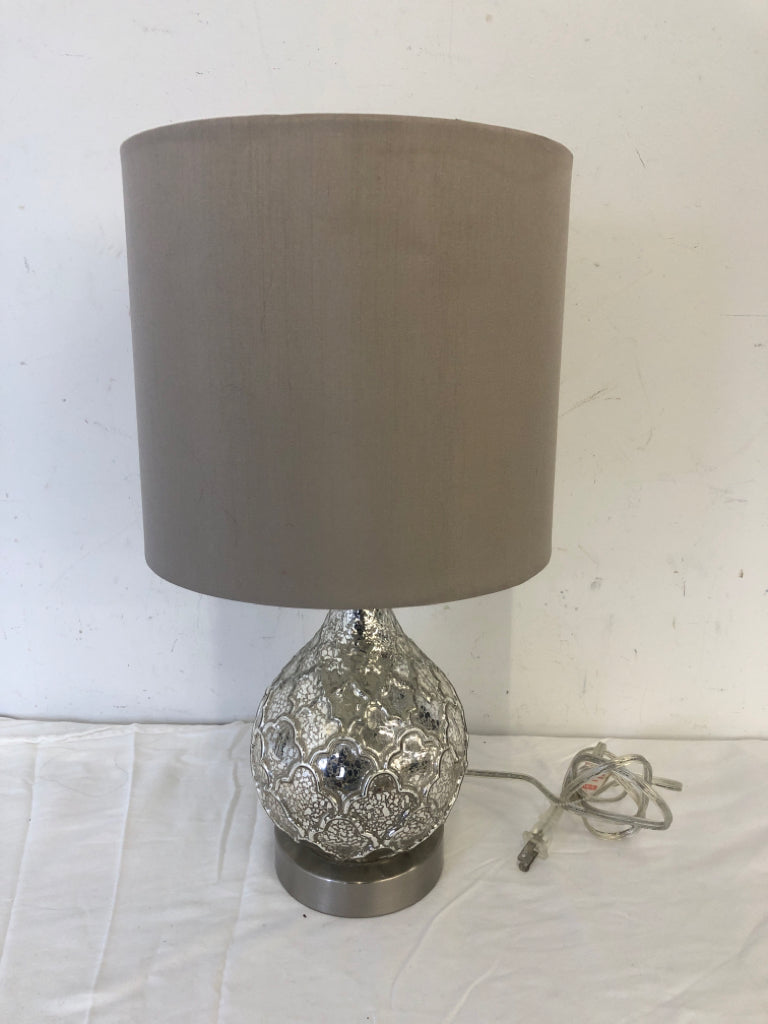 SILVER MERCURY BASE LAMP W TAN SHADE.