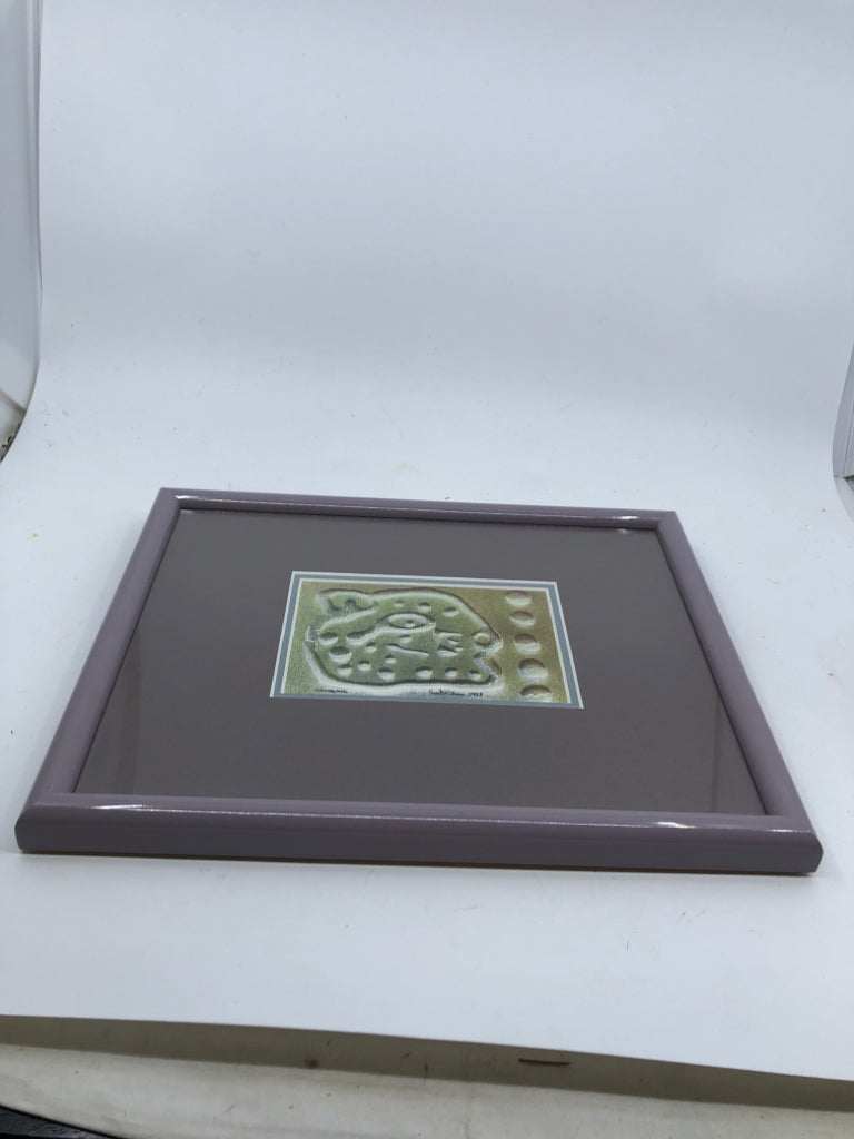 LAVENDER FRAME W/ TEXTURED MULTI-COLORED ABSTRACT DESIGN WALL ART.