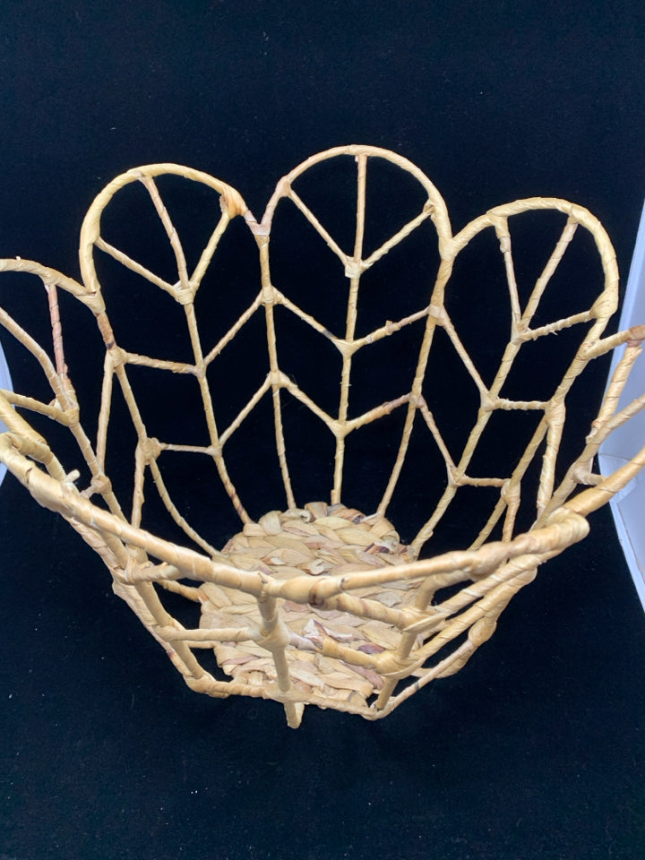 TULIP SHAPED WICKER BASKET.