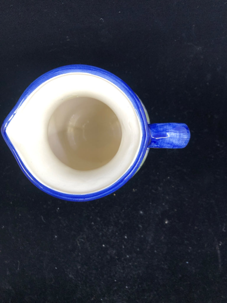 BLUE AND GREEN PAINTED PITCHER.