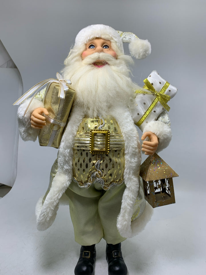 LIGHT WEIGHT SANTA DRESSED IN GOLD SUIT HOLDING PRESENTS/LANTERN.