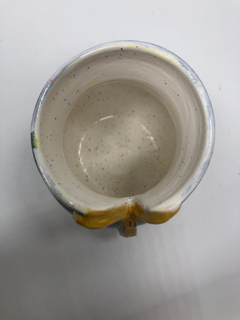 BLUE JEAN SHAPED POTTERY VASE.