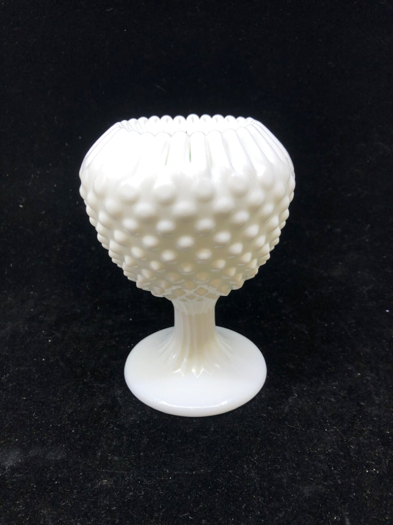 FOOTED MILK GLASS VASE W PINCHED RIM.