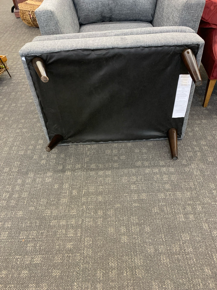 UPHOLSTERED GRAY CHAIR W/OTTOMAN.