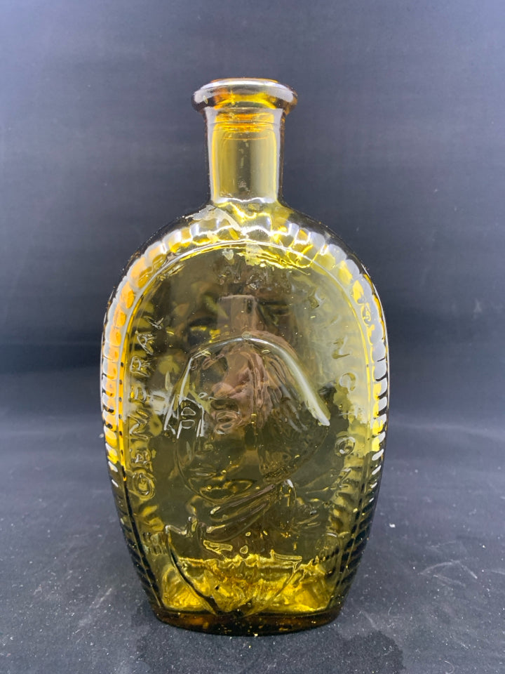 VTG GREEN GLASS EMPTY BOTTLE W EMBOSSED FACE.