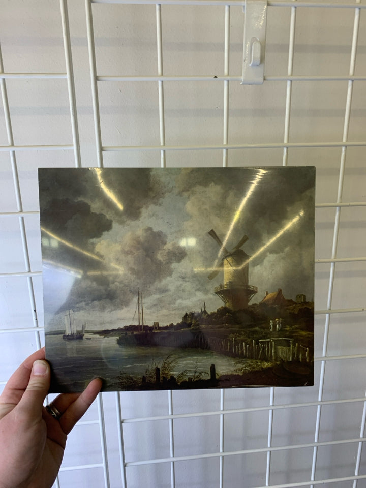 NIP WATER W/ WINDMILL CLOUDY SCENE WALL PLAQUE.