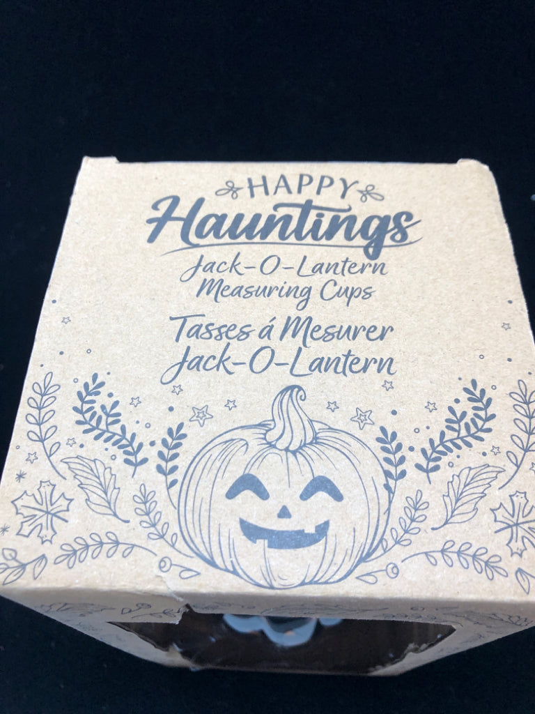 NIB JACK-O-LANTERN MEASURING CUPS.