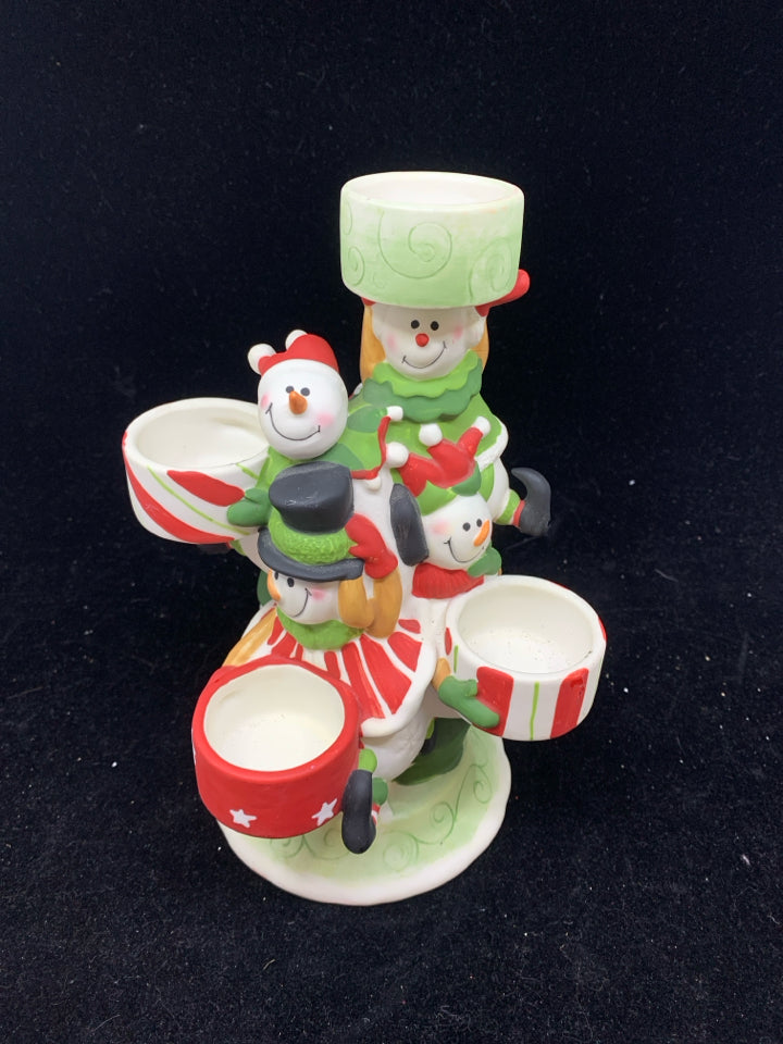 CERAMIC PILE OF SNOWMEN TEA LIGHT CANDLE HOLDER.
