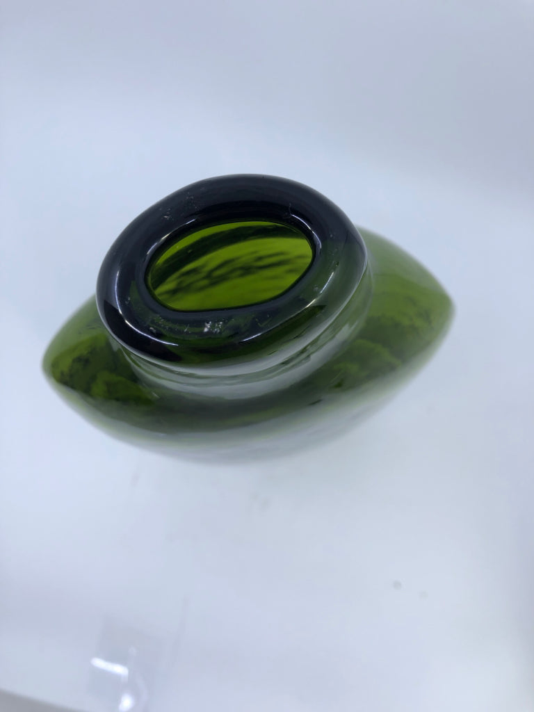 HEAVY OVAL BLOWN GLASS DARK GREEN W/ WHITE LINES.