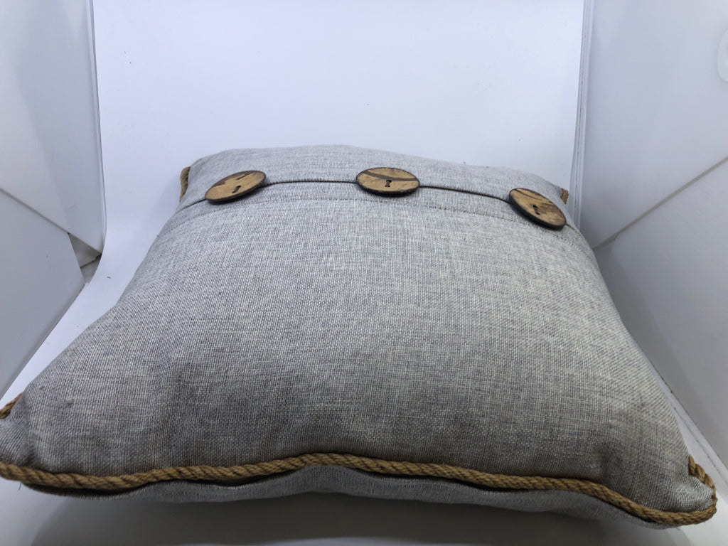 LIGHT GREY SQUARE PILLOW W/ LARGE BUTTONS/ROPE TRIM.