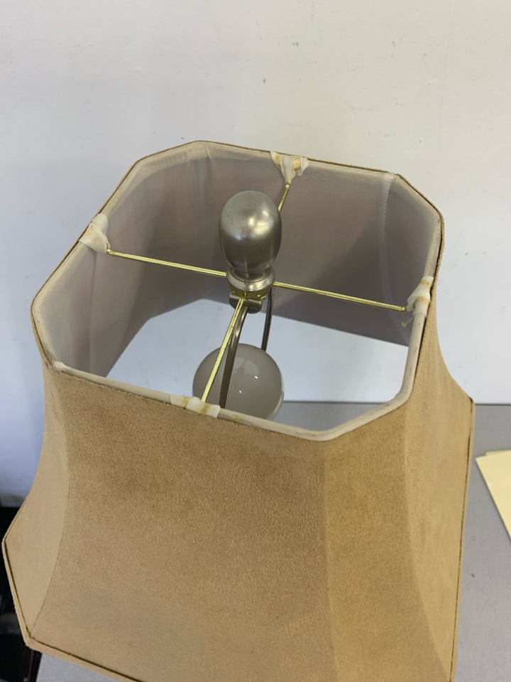 SILVER BASE LAMP W TAN SHADE.