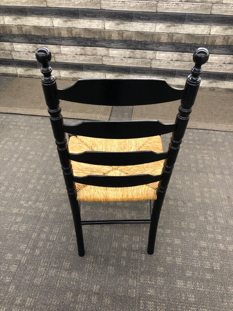 LADDER BACK CHAIR W/HARVEST PATTERN AND WOVEN SEAT.