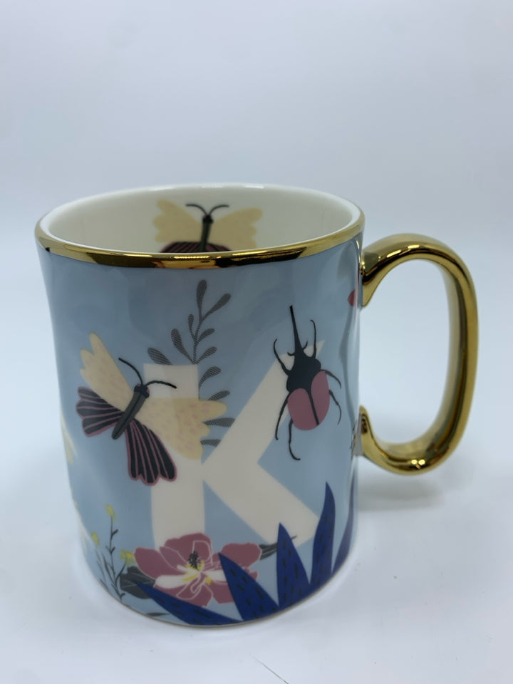 GOLD/BLUE FLORAL "K" MUG.
