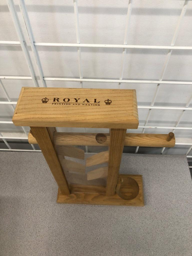 WOODEN ZIG-ZAG RAMP CANDY DISPENSER.