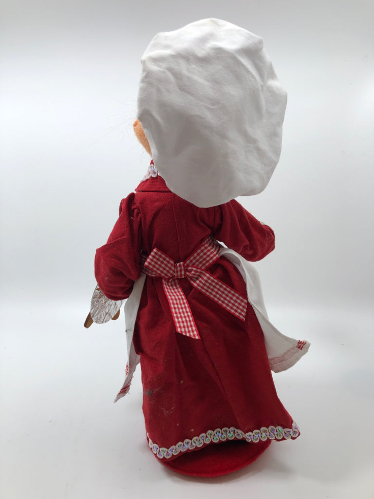 ANNALEE MRS CLAUS DRESSED IN APRON/ CHEFS HAT.