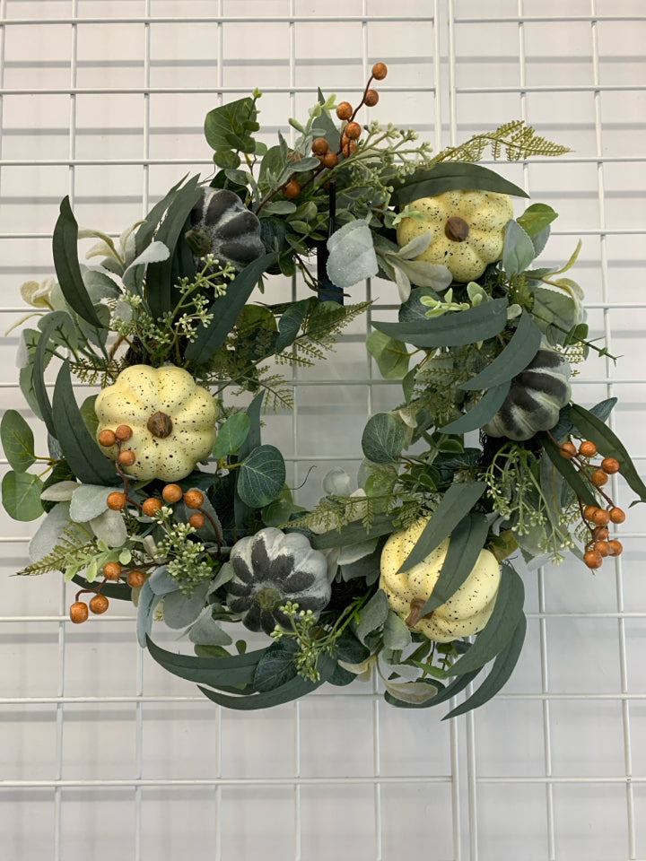 FAUX PUMPKIN AND GREENS WREATH.