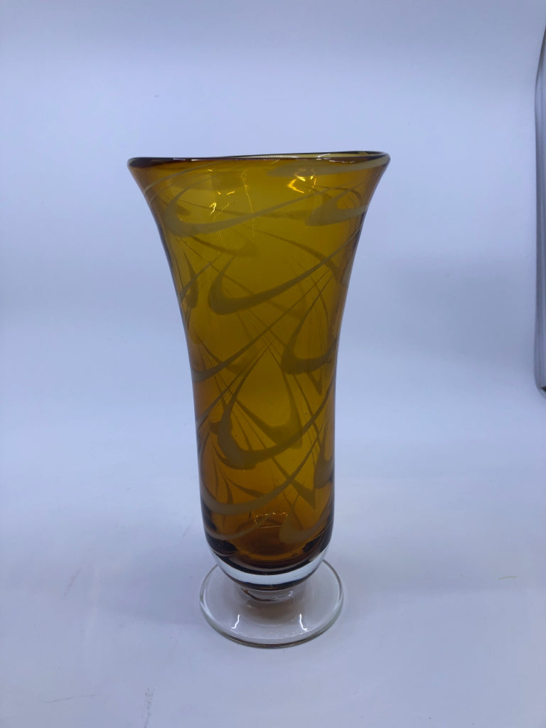 AMBER GLASS FOOTED VASE W/WHITE SWIRL.